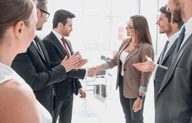 handshake business partners before a business meeting