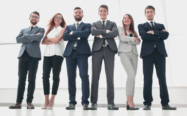 bottom view. successful business team standing in a spacious office