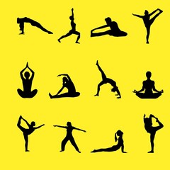 silhouettes of yoga poses with yellow background 