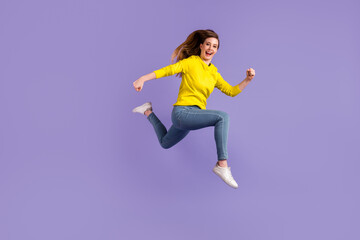 Fototapeta na wymiar Full size profile side photo of young excited girl runner jumper hurry isolated over purple color background