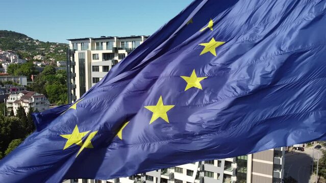 European union flag Against City at summer day