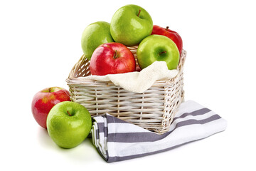 Red and green apples in a wicker basket. Isolate on a white background.