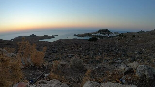 Sunrise time-lapse with Lindos village in Rhodes