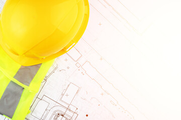 autocad drawing, Architecture and construction, builder's hard hat and safety vest on architectural...