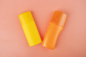 sunscreen, beach cream, sun protection,spf, yellow and orange bottle, skin care