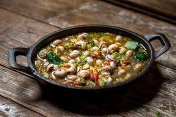 Caracois | Baby snails in white wine sauce