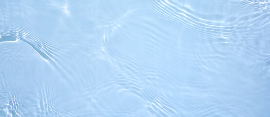 Transparent blue clear water wave surface texture with splashes and bubbles. Abstract summer banner...