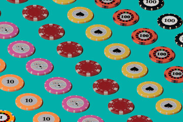 Pattern from casino chips on a green screen chroma key. Rows of casino chips for gambling, poker,...