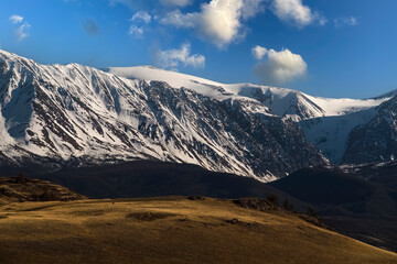 North Chuya Ridge. Evening sky with beautiful clouds. Kurai steppe. Altai Mountains, Russia