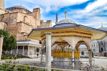 Fototapeta premium Religious Fountain/ Washington Area outside Hagia Sophia in Istanbul's Old City in the Summer - Istanbul, Turkey