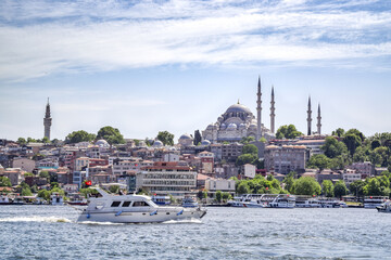 Luxury Yacht on Golden Horn and Suleymaniye Mosque in Istanbul in the Summer - Istanbul, Turkey