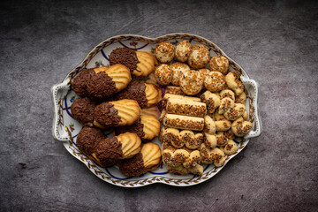 Sesame crackers cookies and Petit four marmalade and chocolate truffle garnish