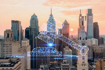 Aerial panoramic cityscape of Philadelphia financial downtown, Pennsylvania, USA. City Hall Clock Tower, sunset. Hologram of legal icons. The concept of law, order, regulations and digital justice.