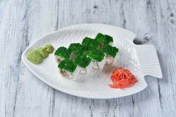 sushi, shrimp rolls, Japanese omelet, Philadelphia cheese, green tobiko caviar, ginger and wasabi