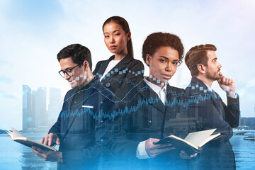 Group of business colleagues working on new venture capital and hi-tech start up and try to...