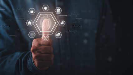 Young businessman scanning fingerprints for advanced security login,