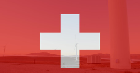 Image of flag of switzerland over wind turbine