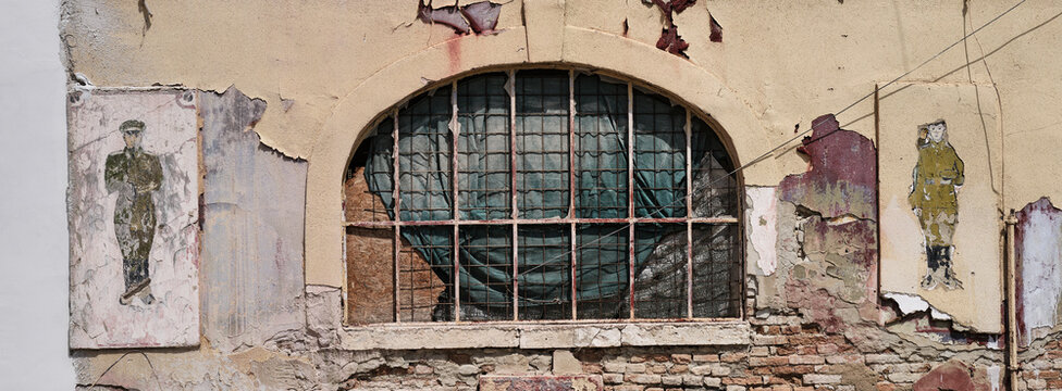Russian soldiers, from the period of the occupation of Czechoslovakia in 1968, painted on the facade of the old fortress in Kom&aacute;rno, Slovakia