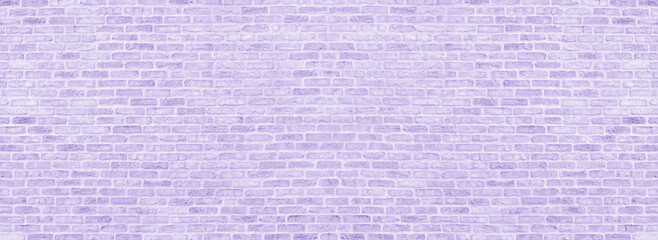 Lavender color old shabby brick wall wide texture. Pastel purple rough brickwork. Abstract vintage panoramic textured background