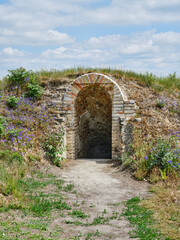 Entrance to the pedestrian brick tunnel from the lookout in the old fortress in Komárno, Slovakia