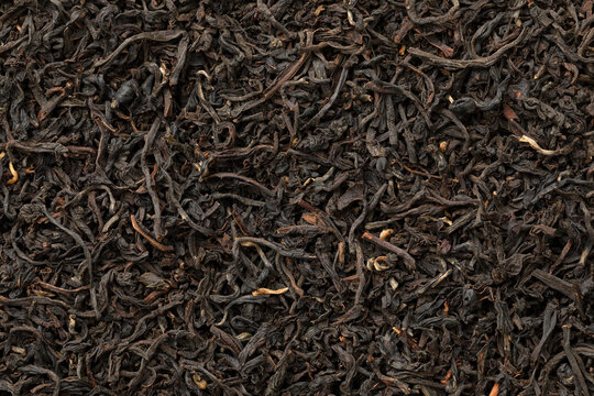 Heap of Indian Assam tea full frame close up as background