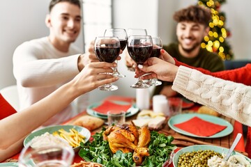 Group of young people celebrating christmas