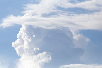 whimsical cloud on the blue sky