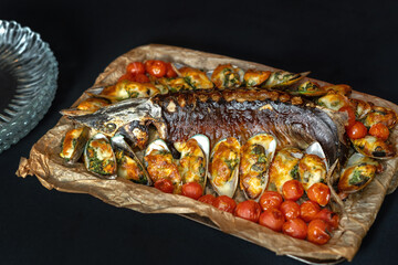 Seafood, Mediterranean cuisine. Baked sturgeon fish with grilled vegetables.