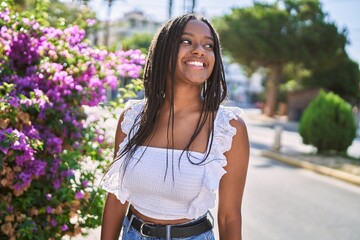 Young african american girl smiling happy standing at the city. © Krakenimages.com