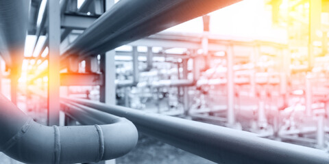 Concept background industrial factory zone. Steel pipelines, valves and ladders modern gas power...