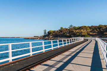New causeway from Victor Harbor to Granite Island on a day, Fleurieu Peninsula, South Australia - obrazy, fototapety, plakaty