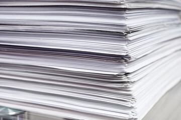 A stack of white office papers