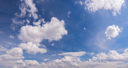 blue sky background with tiny clouds