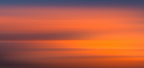 Fototapeta premium Colorful cloudy sky at sunset. Gradient color. Sky texture, abstract nature background motiom blur.