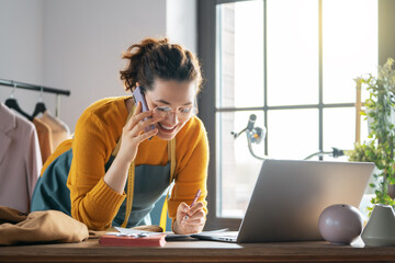 Woman is working at workshop