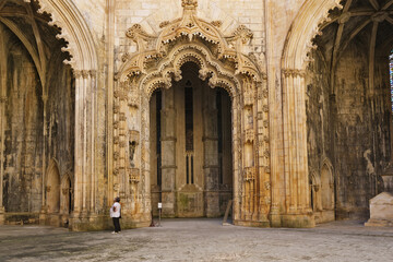 carved arches, pillard and vaults in Interior of the Unfinished chapels in Batalha monastery,...