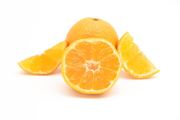 selective focus Tangerine or komola in a plate isolated on white background,