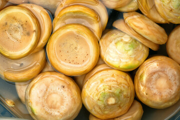 Artichoke bottoms in water.