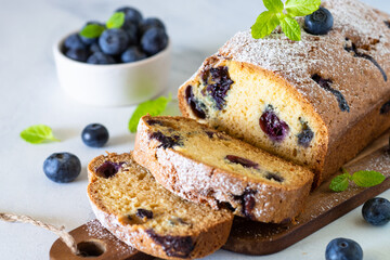 Blueberry cake on white background. Homemade sweet baking.