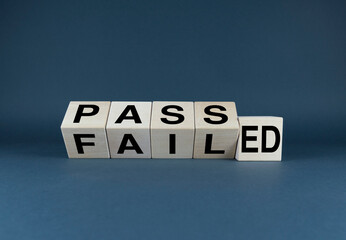 Passed or Failed. Cubes form the choice words Passed or Failed.