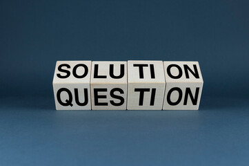 Question - Solution. The cubes form the words Question - Solution.