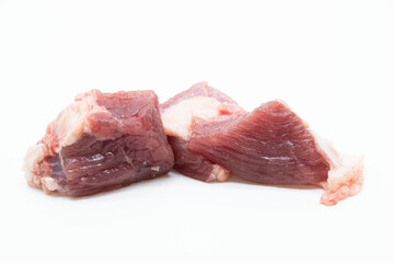 fresh Pile of beef cubes isolated on white