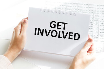 Get Involved. Text on a sheet of paper.