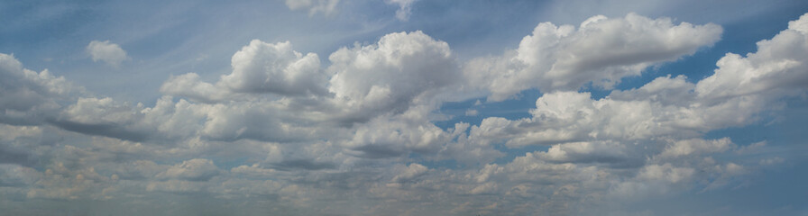 Beautiful white clouds in blue sky, panoramic skyline background with cloudy sky