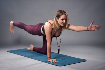 Young woman yoga trainer