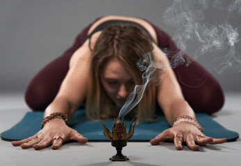 Young woman yoga trainer