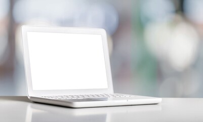 Laptop displaying a blank screen on the desk