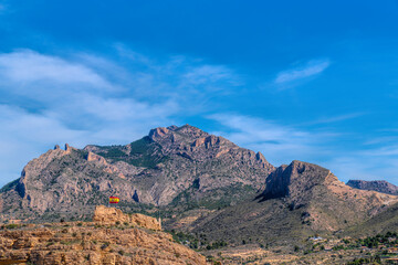 Busot Castle Spain with mountains in historic village tourist attraction near El Campello and Alicante