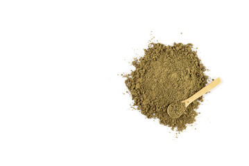 Hemp protein powder in a wooden spoon on a white background. Horizontal orientation, top view, copy space.