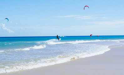 summer fun and water sports, jumping on the waves with kite surfing.Fuerteventura, Canary Islands